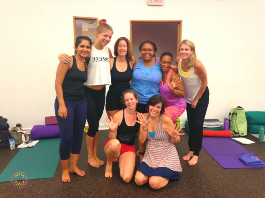 Tosh (top row) during her yoga training.
