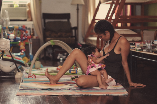 Poet and activist  Staceyann Chin  breastfeeding her daughter Zuri. Photo credit: J. Quazi King