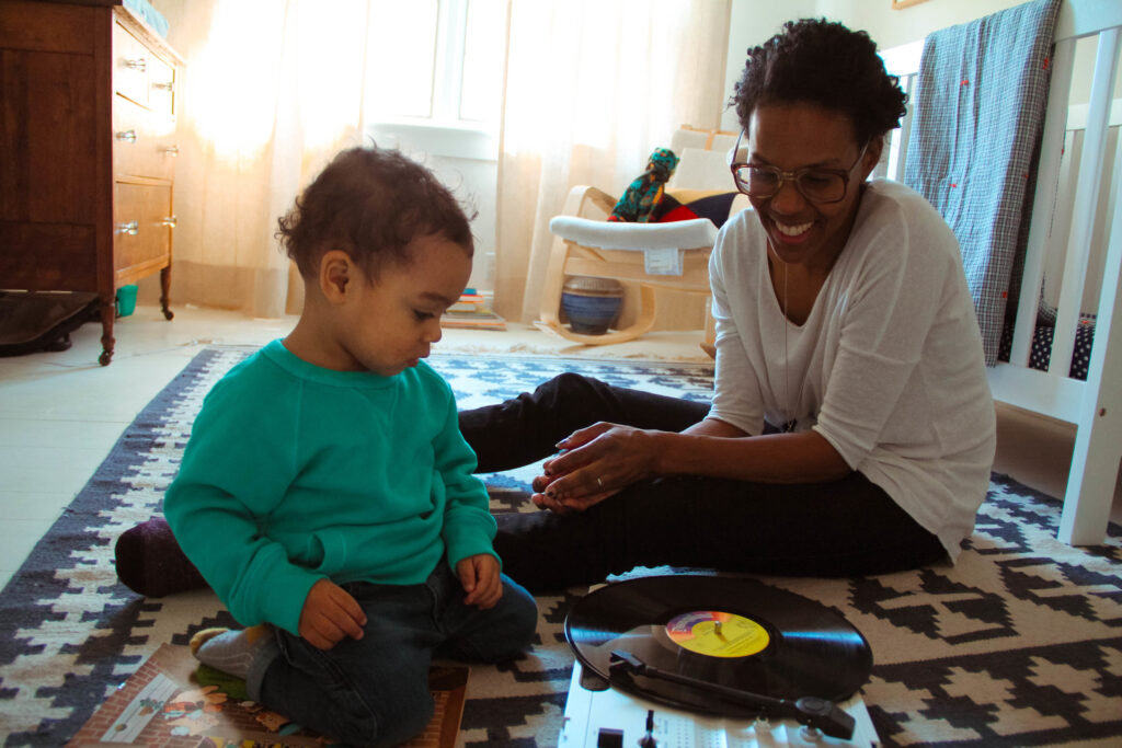 DJ Lindsey scratching with her son