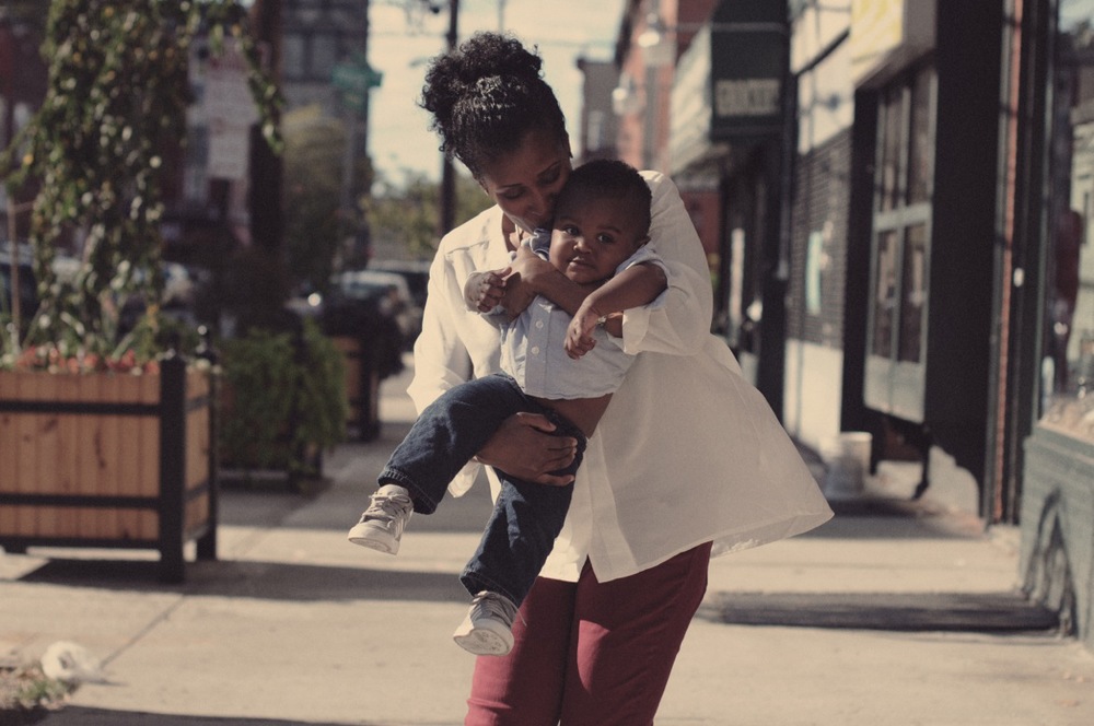 Crystal Black Davis kissing her son, Elijah