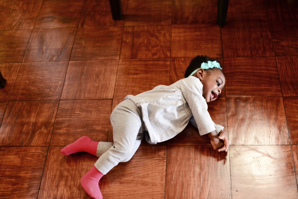 Omolara, playing on the floor
