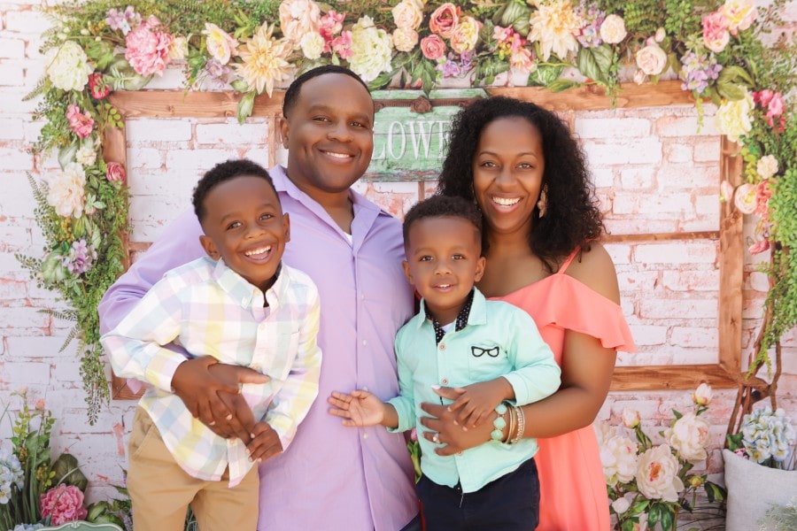 Black dad with wife and 2 sons